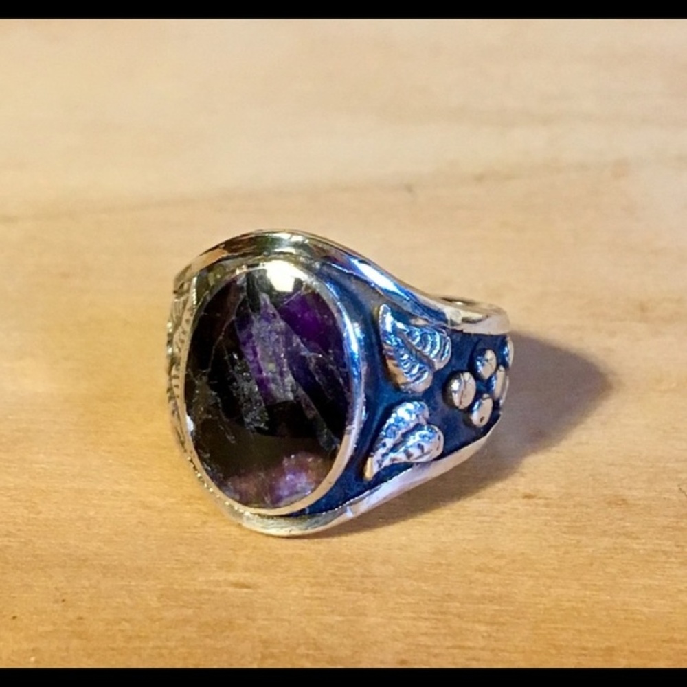 Silver ring w/ wine grape pattern and purple stone